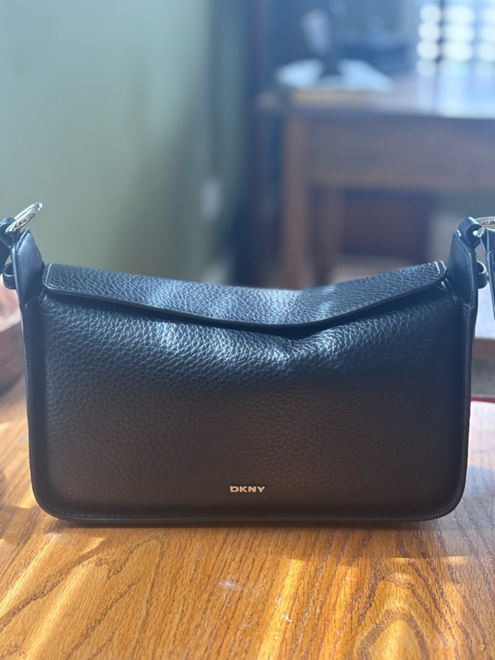DKNY Black Pebbled Leather Shoulder Bag with silver accents magnetic closure